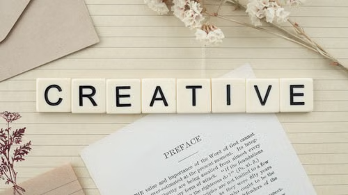 Creative lettering arranged on desk tiles